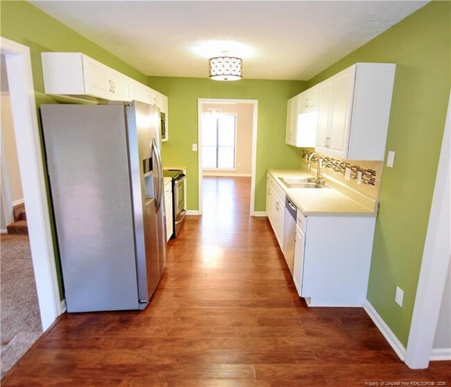 Building Photo - 6933 Woodmark Dr