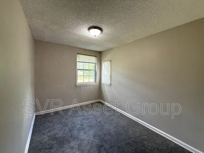 Building Photo - 9073 11th Ave