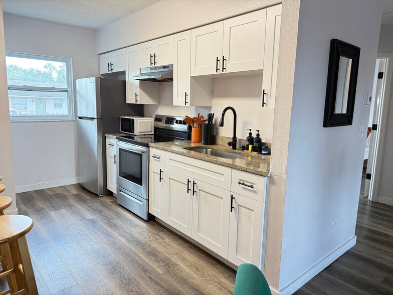 Building Photo - 4590 76th Ave N