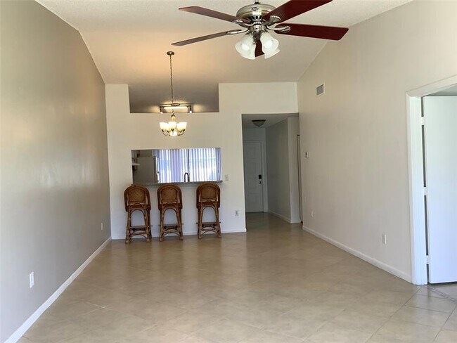 Building Photo - 10128 Boca Bend E