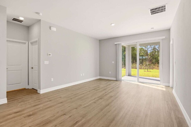 Building Photo - Brand New 4-Bedroom Gem with 2 Full Baths on Large Lot in Lehigh Acres – A Perfect Family Haven!