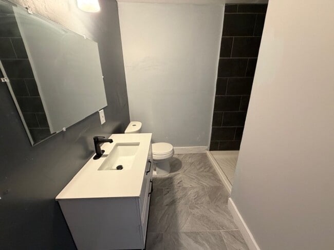 Building Photo - Charming 4-bed, 2-bath brick colonial home Contact KPM Detroit 313-429-3244