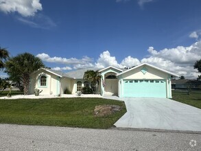 Building Photo - "Charming 3-Bedroom Home with Pool Oasis"