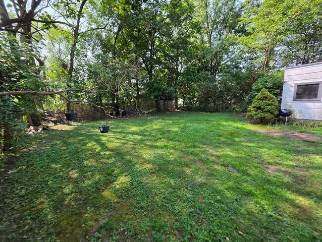 Building Photo - 2 Bedroom, 1 Bathroom West Hill Home with Fenced Yard, Garage, & Bonus Living Space