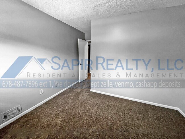 Building Photo - Move in before January 15th and choose your reward: a $250 Amazon Gift Card or a 55" Smart TV!