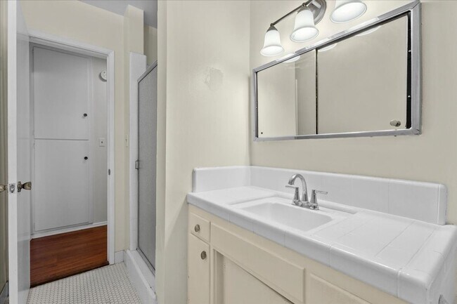 Building Photo - Light-Filled Top Floor Retreat in the Heart of Franklin Village