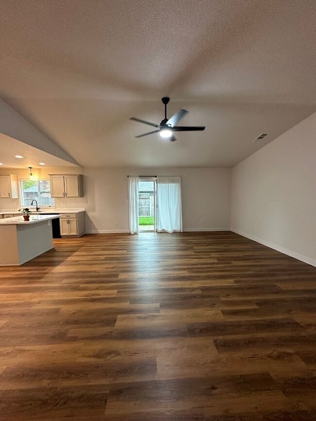 Building Photo - Updated Home with Island Kitchen, LVP Flooring, and Yard Care Included!