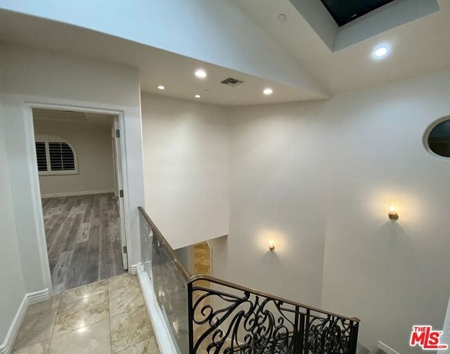 Building Photo - 349 S La Peer Dr