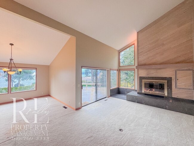 Building Photo - Vaulted 2-Bed Home with Scenic Views, Gas Fireplace & Oversized Deck