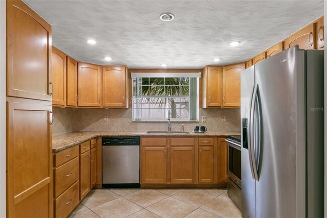 Building Photo - 7114 Parrot Dr