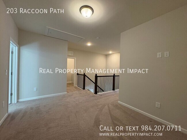 Building Photo - 203 Raccoon Path