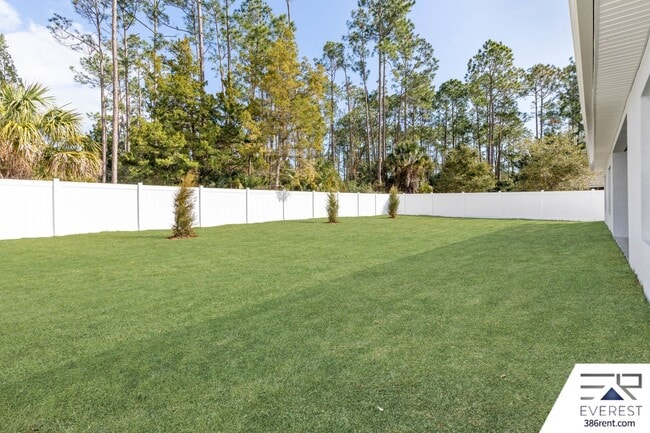 Building Photo - FULLY FENCED, UPGRADED 3/2/2 IN DESIRABLE PINE GROVE