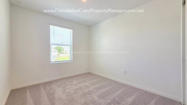 Building Photo - OUTSTANDING BRAND NEW TOWNHOME MOVE IN READY! AZARIO TOWNHOMES LWR !