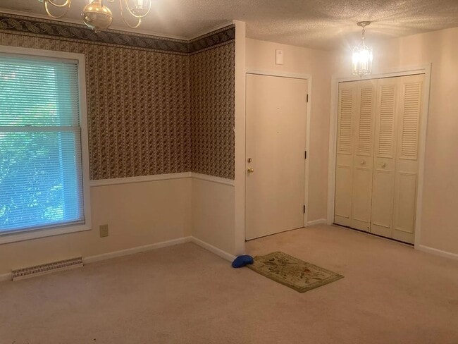 Building Photo - Beautiful Duplex Located in Serene, Wooded...