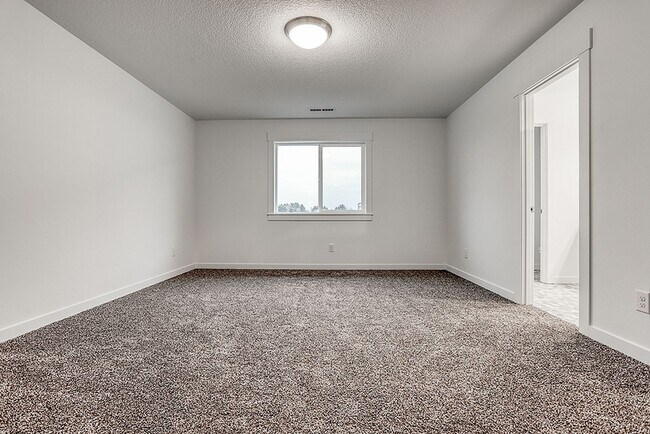 Building Photo - Modern Living in the Heart of Ridgefield: Quartz Finishes & Open-Concept Charm
