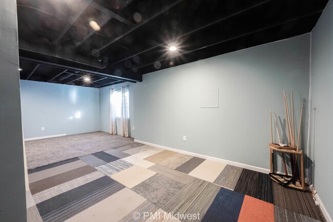 Building Photo - "Spacious 4-Bedroom Gem with Finished Base...