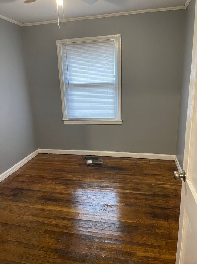 Building Photo - 3bed house in the county! Central all electric hvac, laundry, yard and hardwoods.