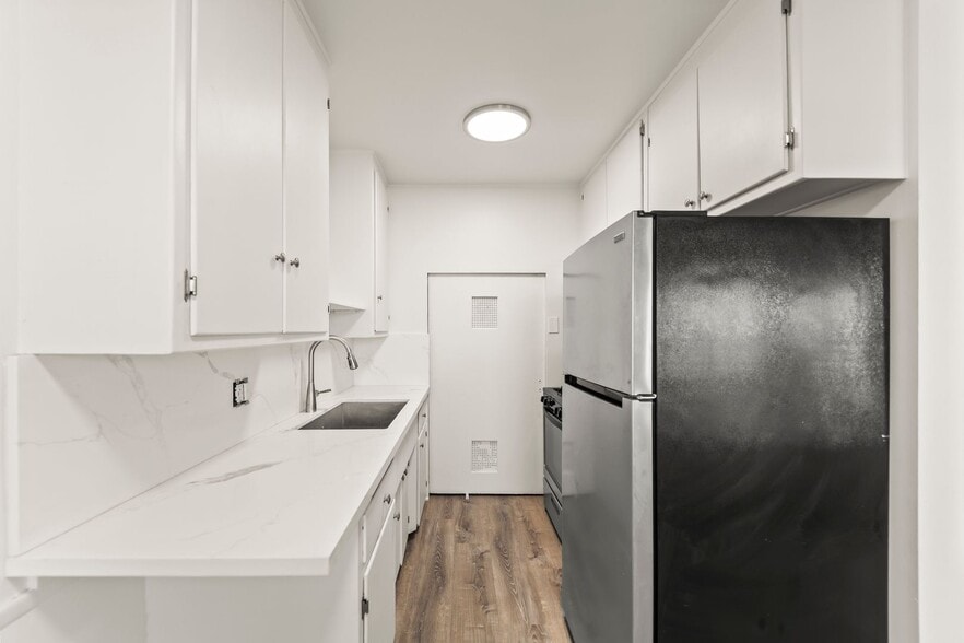 Building Photo - 7015 8th Ave