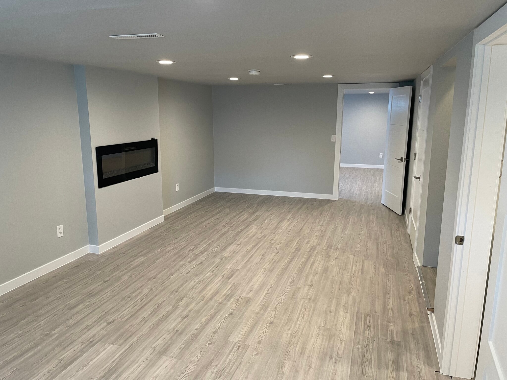 Downstairs Living Room 3 - 3011 N Stout Rd