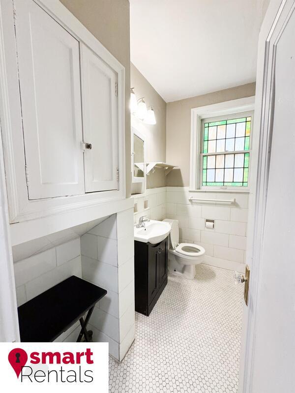 Building Photo - 7204 Zephyr Place - 2E