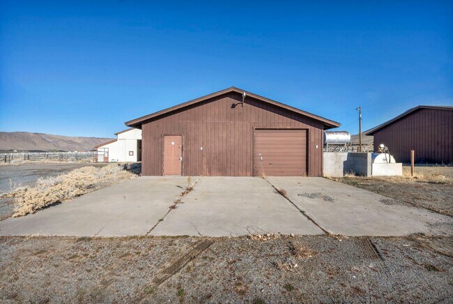 Building Photo - 20 Acre Ranch with House, Barn, Separate Workshop, and 5-Car Garage