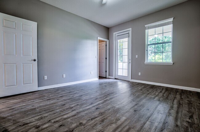 Building Photo - Beautiful 3/3 w/ 2 Car Garage in Gated Vil...