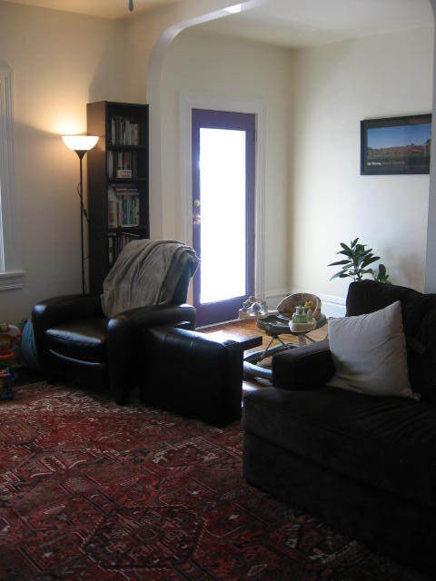 Living room alcove area with door leading to out front covered deck. - 364 Lehigh Ave