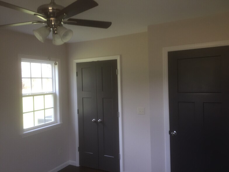 Bedroom #2 at the end of the hallway. Double door closet & hall door. - 80 Villa Lane