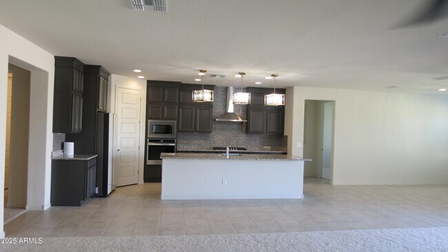 Building Photo - 5862 N 86th Dr