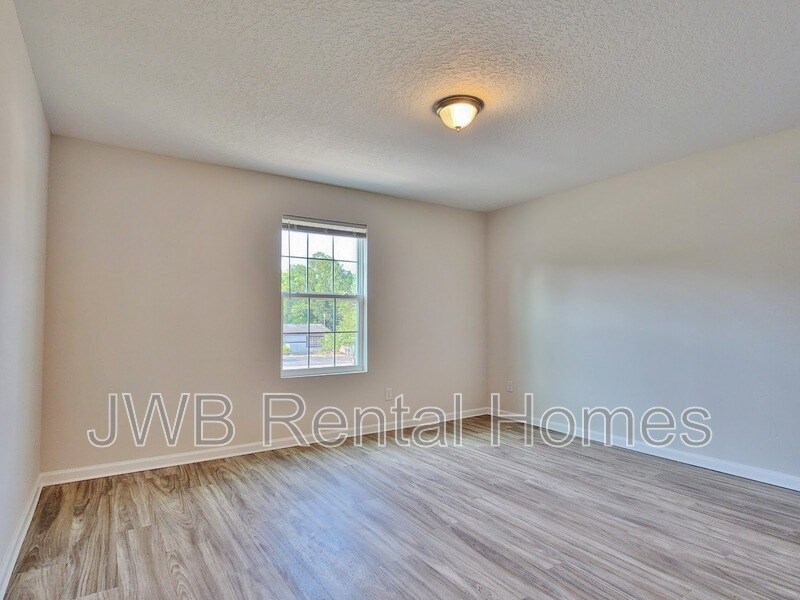 Building Photo - 8496 McGirts Village Ln