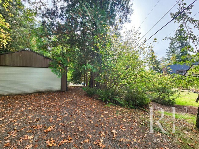 Building Photo - Waterfront Tudor | Private, Vintage Charm