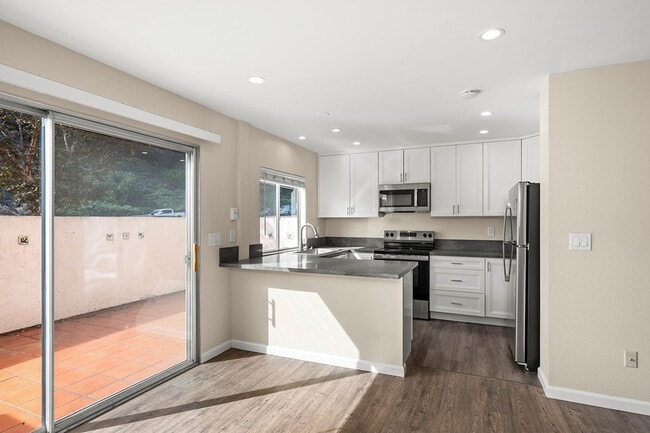 Building Photo - Spacious 4-Bedroom 2.5-Bathroom Townhome 50% Off 1st Month!