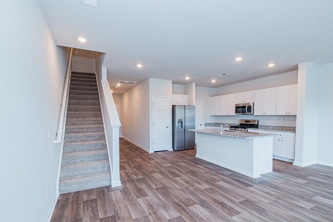 Building Photo - Brand-new 3 bedroom, 2.5 Bath Townhome with pond view