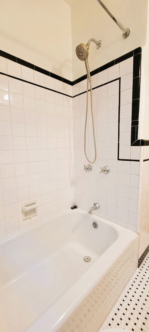Building Photo - Remodeled brick bungalow with 1st floor li...