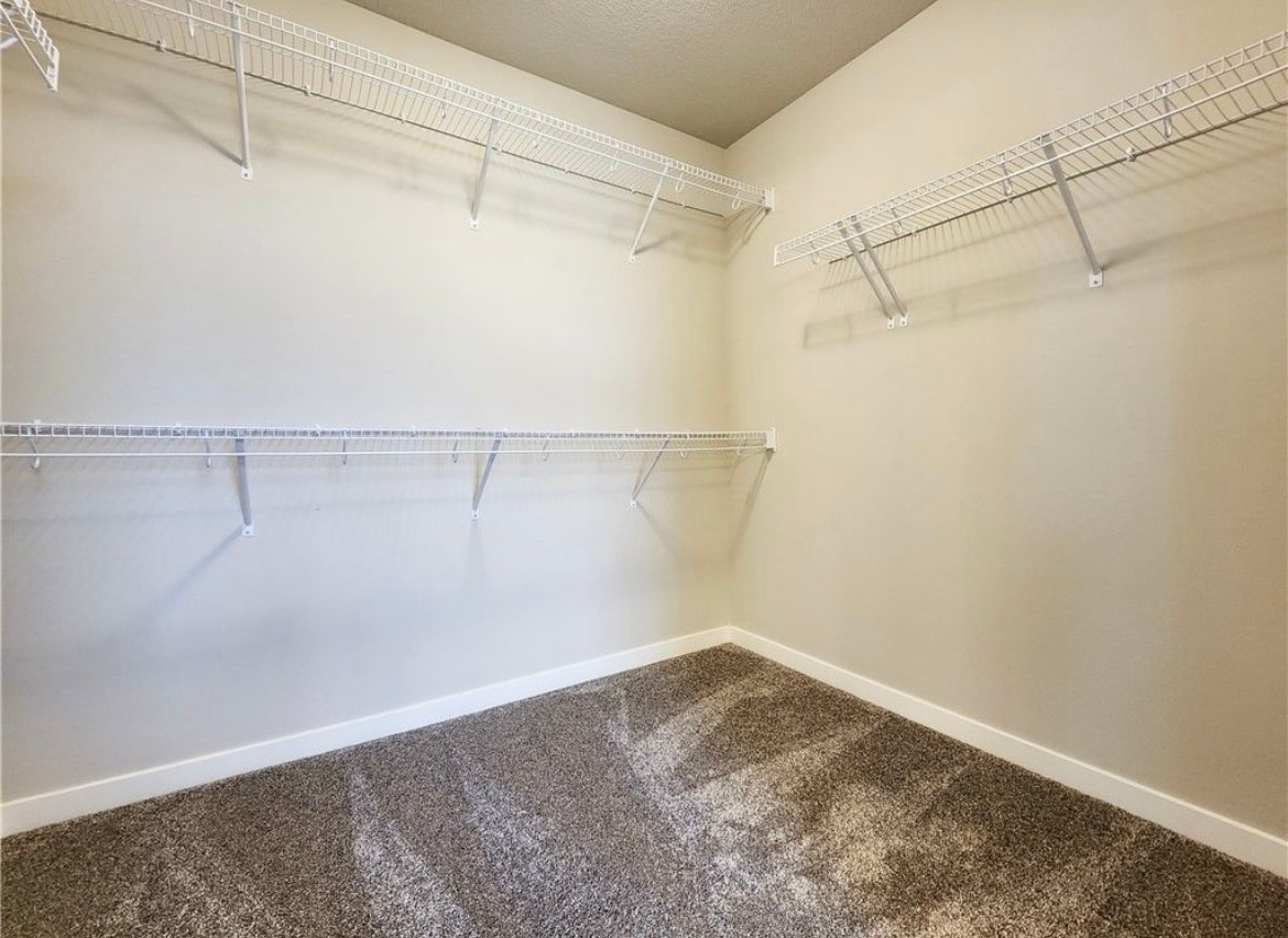 Walk in master bedroom closet - 4032 NE Timber Ln