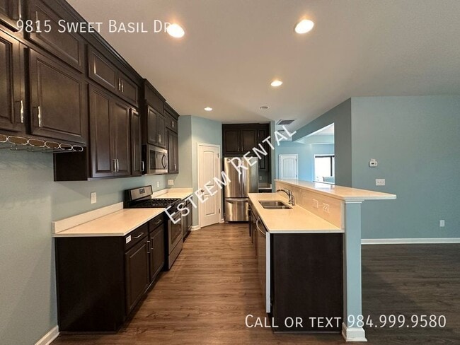 Building Photo - 9815 Sweet Basil Dr