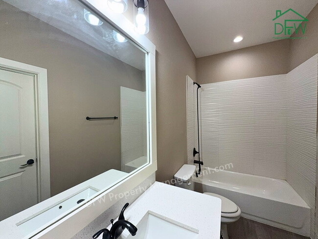 Building Photo - Spacious 4-Bedroom Corner Home - 2-Car Garage, Fenced Yard