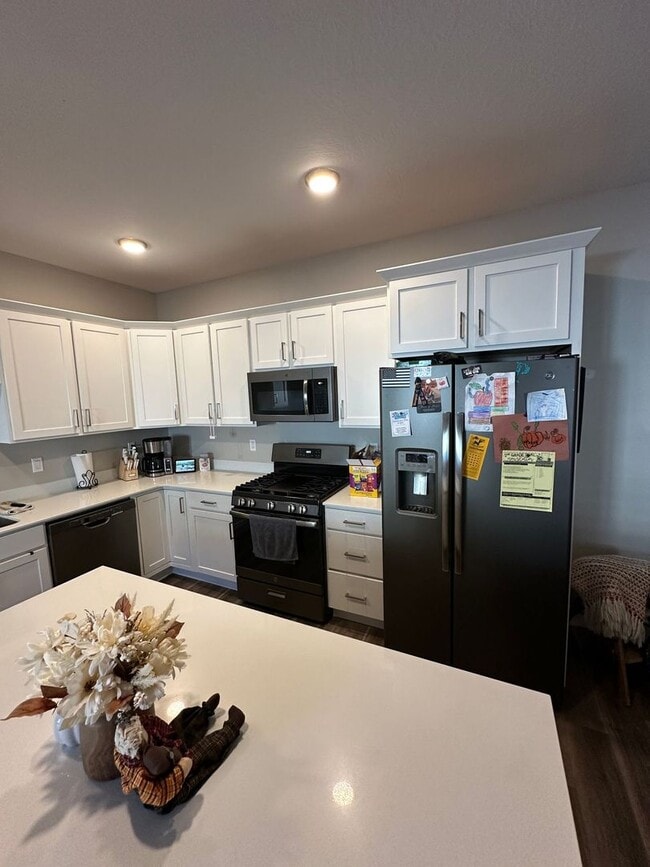 Building Photo - Three bedroom, 2.5 bath townhome