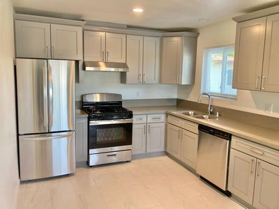 Full kitchen with stainless steel appliances - The Junipero Palm Springs