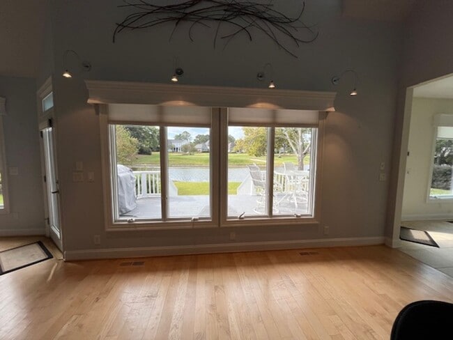 Building Photo - Welcome to Elegant Living in the Charming Porters Neck Plantation Community!