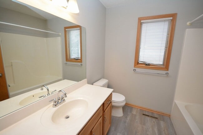 Building Photo - Twin home with walk-out basement & great updates!