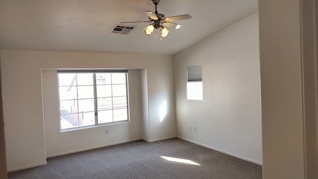 Building Photo - Townhome with Loft + Two Bedrooms/Baths - Designed for Comfort in Gated Community