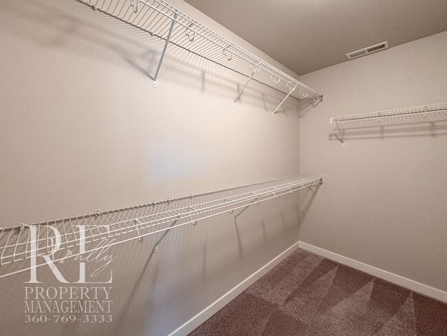 Building Photo - Vaulted Ceilings, Tree-Lined Views & a Spacious Primary Suite Retreat