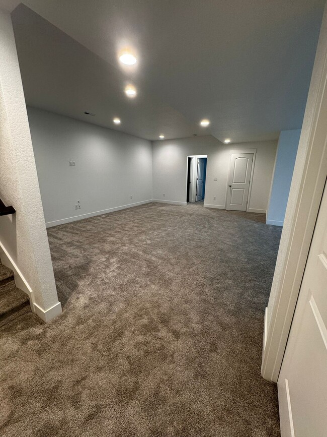 living space in the basement - 21622 E 60th Ave