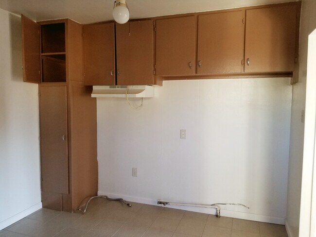 Building Photo - Triplex Unit Coming Soon
