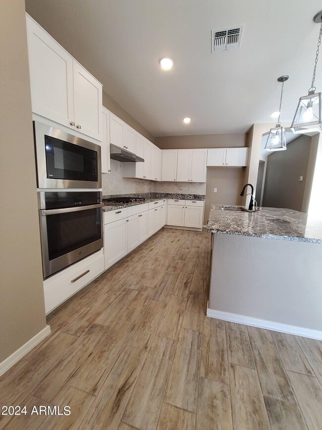 Building Photo - 704 N 152nd Dr