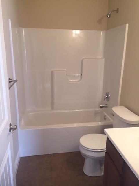 Building Photo - NEW! 2 bedroom, 2 bathroom, 1 car garage! All one Level!