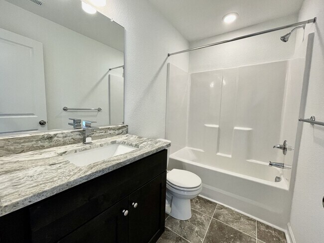 Building Photo - Practically New & Available NOW! Americana...