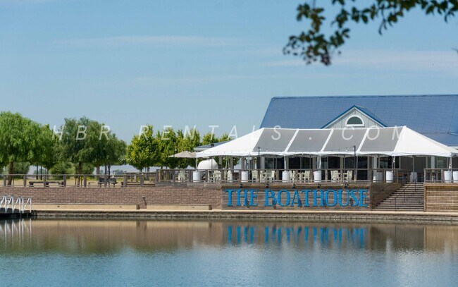 Building Photo - Modern River Islands Home with Solar – Spa...