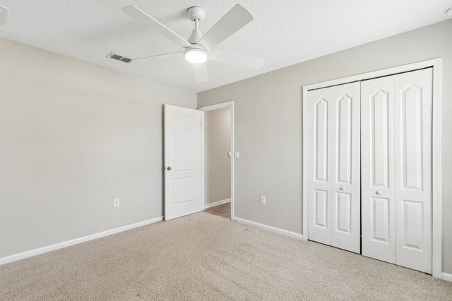 Building Photo - Modern 4BR Home with 3 Full Baths in River Glen | Screened Porch & Resort-Style Amenities